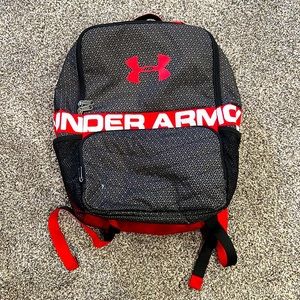 Red and black under armor backpack